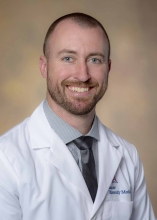 Aaron Thomas, MD