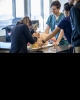 A student practices intubation on a mannequin