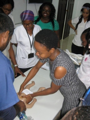 Photo 4 Practicing neonatal resuscitation