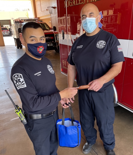 Firefighter EMT Pablo Paez and Firefighter Paramedic German Arana. 